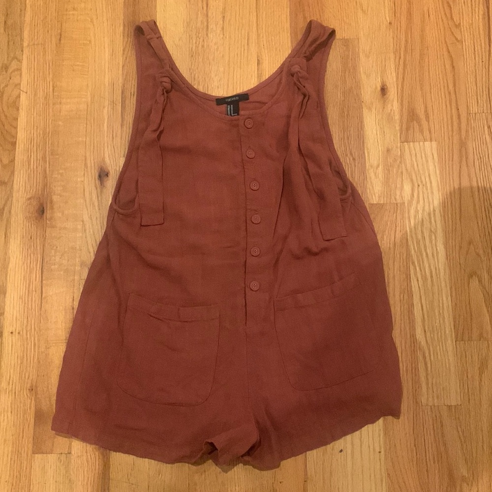 Light maroon button down romper with tie straps